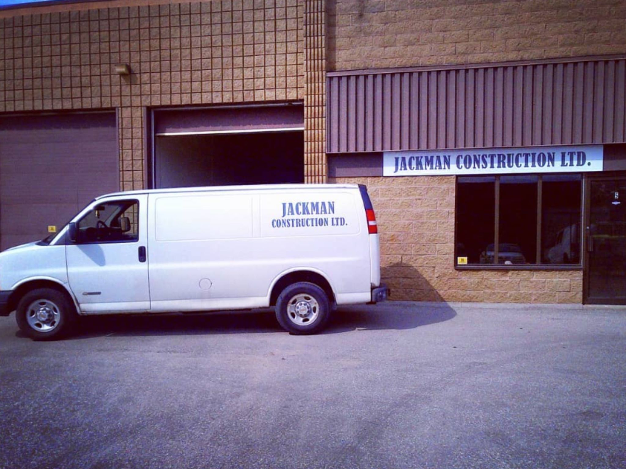 Jackman Construction Ltd. service van outside the company office