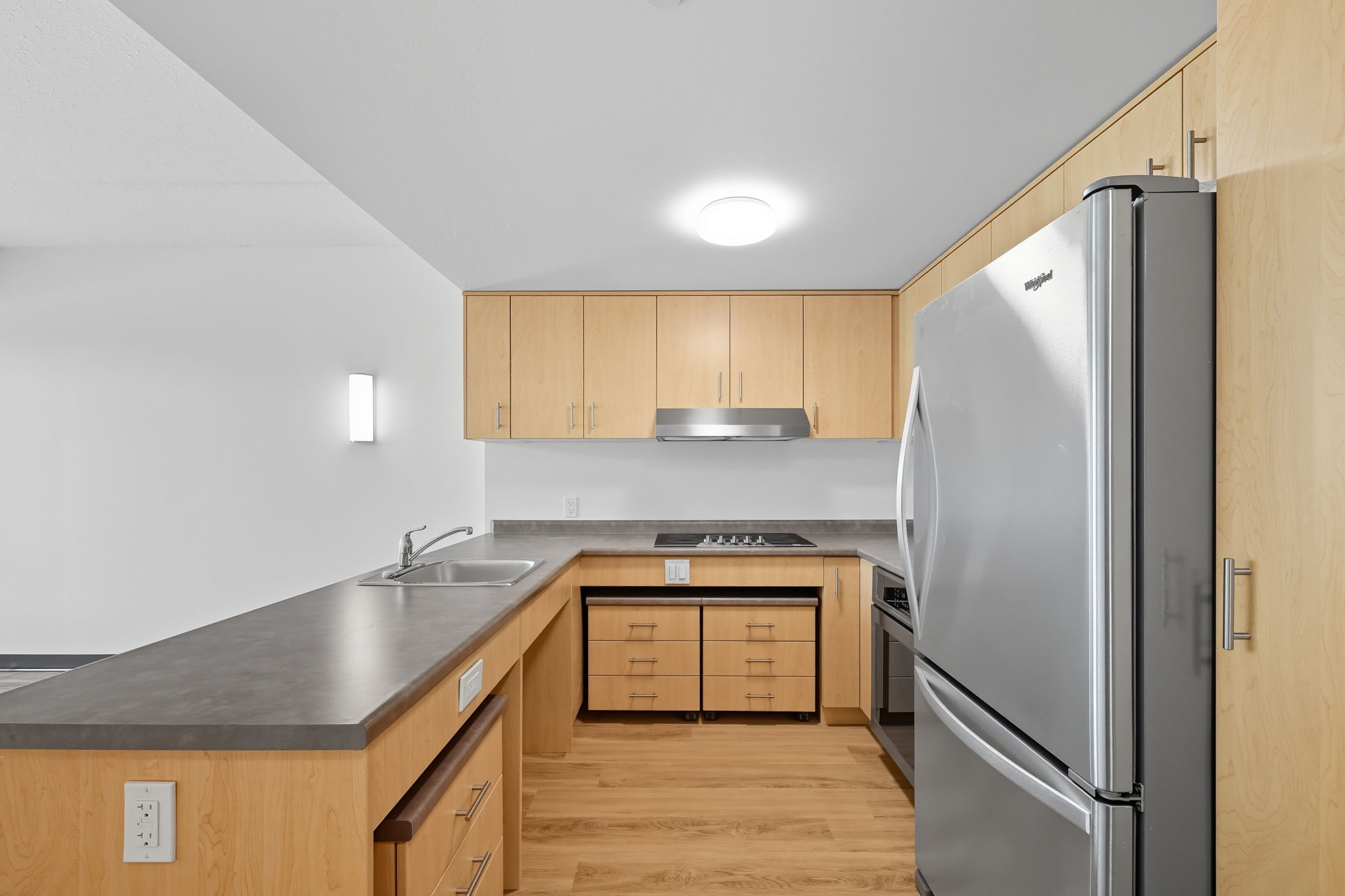 Roll-under cooktop
