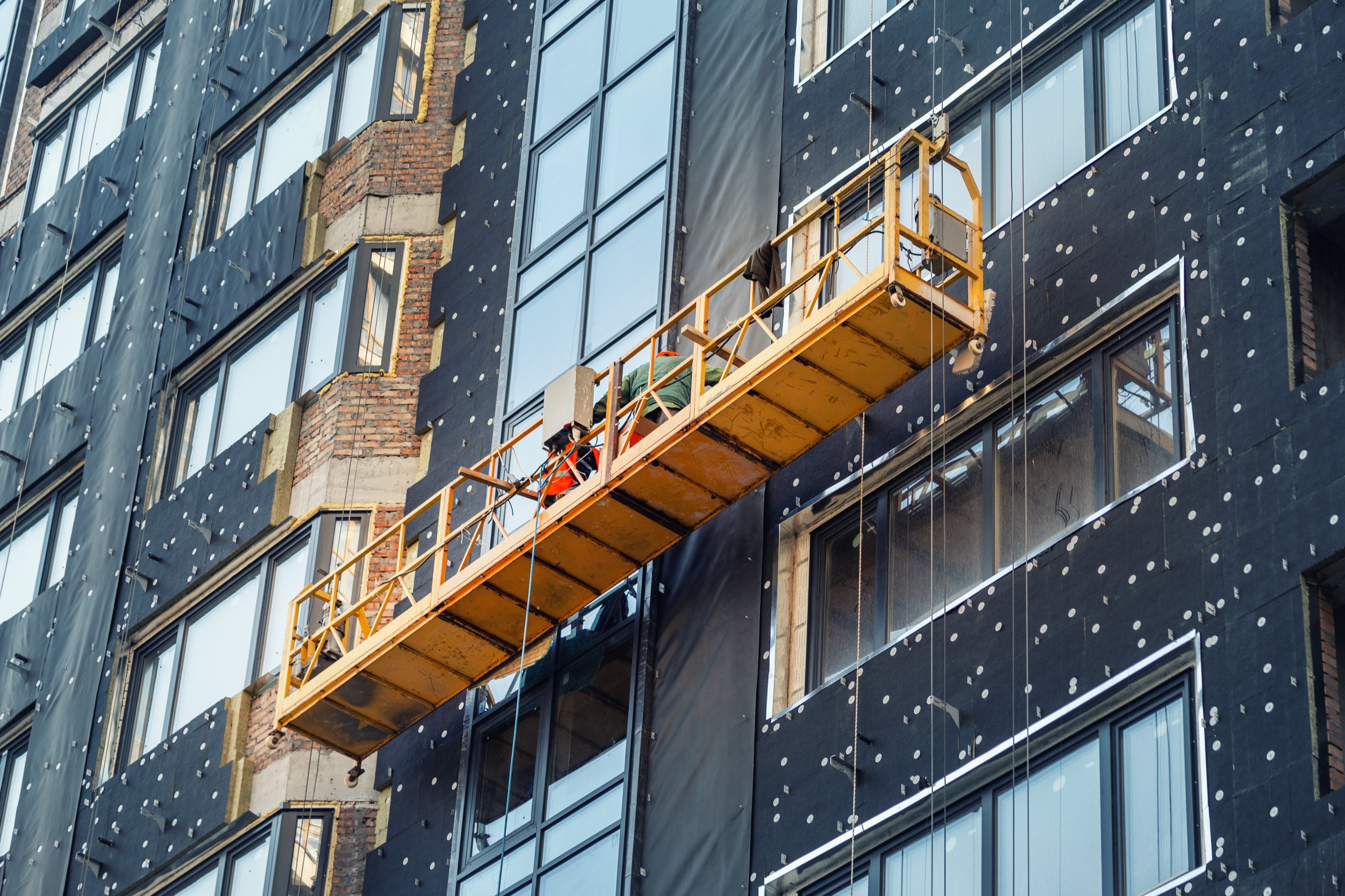 Exterior insulation board installed on a multi-storey commercial building